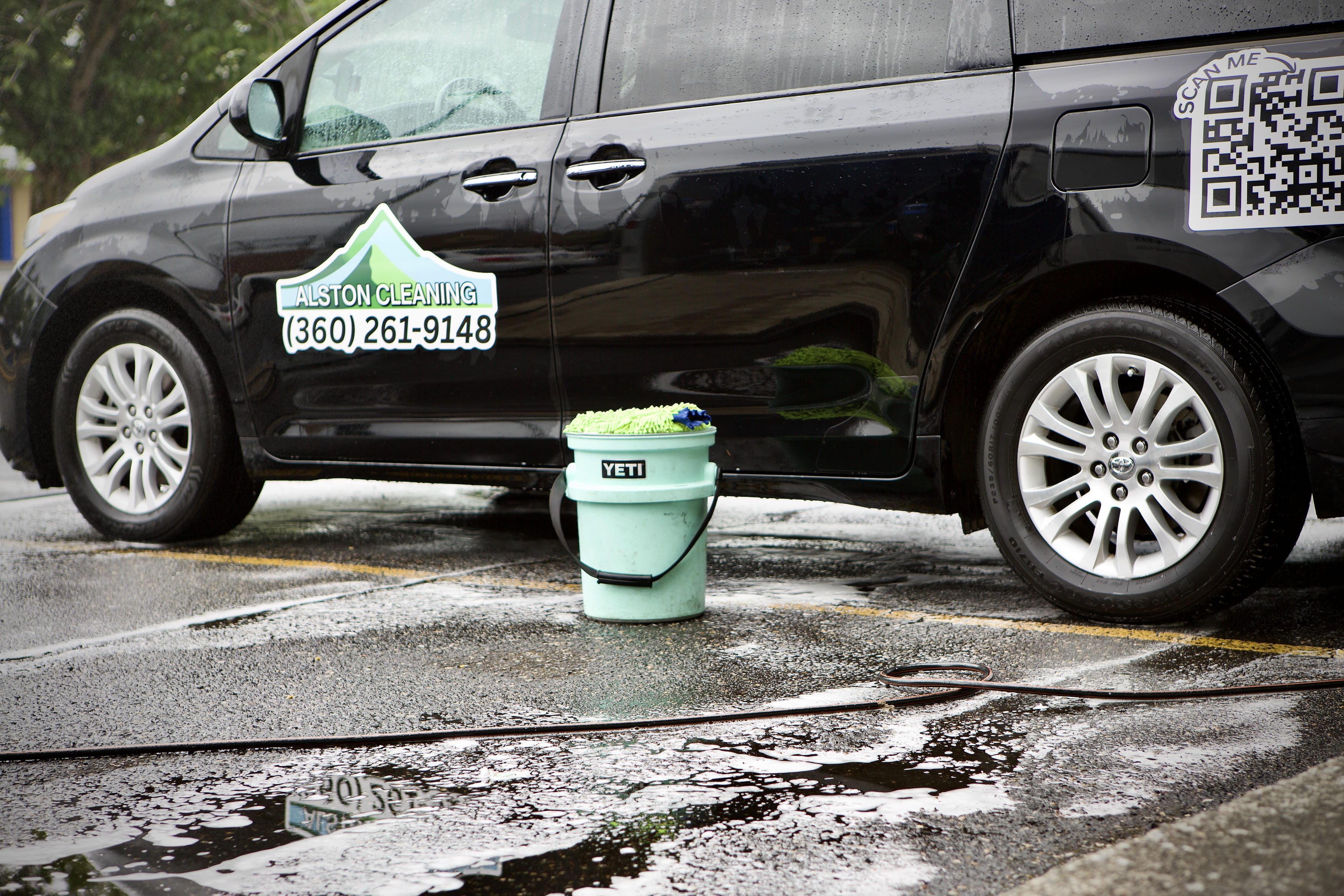 Branded Alston Cleaning service van with cleaning supplies